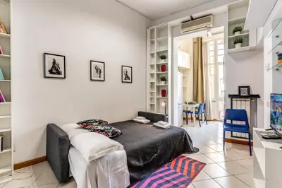 a bedroom with a bed in a room at Residenza Como in Rome