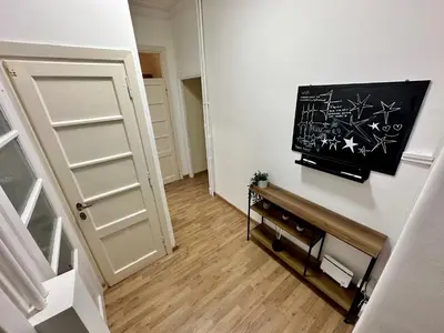 a room with a door and a chalkboard on the wall at Rhome Holiday Fornaci in Rome