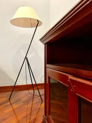 a lamp sitting next to a table next to a piano at Inn Sistina Home in Rome