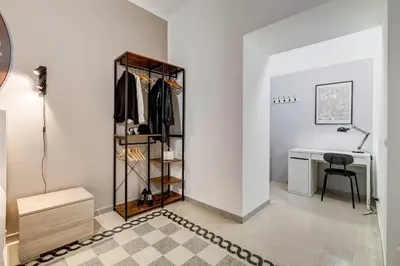 a dressing room with a desk and a closet at The Great Beauty - 2 double bedrooms & 2 bathrooms in Rome