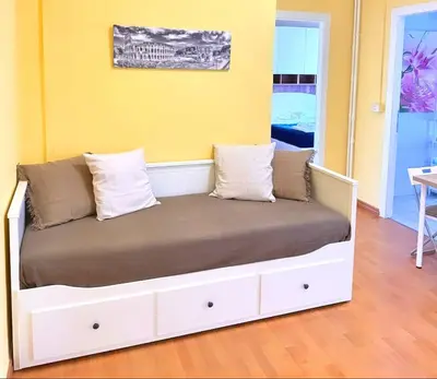 a bed with two pillows on it in a room at Giuliana St.Peter Apartment in Rome