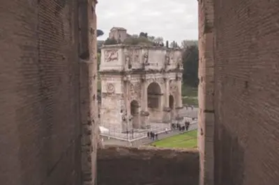 a view of an old building from a window at Principe Umberto Apartment in Rome