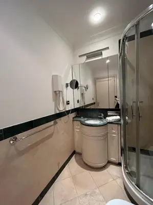 a bathroom with a shower and a sink and a toilet at Auditorium Maxxi luxury suite Roma in Rome