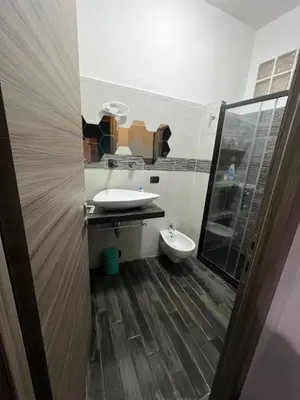 a bathroom with a sink and a toilet at Nathan House,Teano in Rome