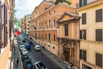 a view of a city street with cars parked at Barberini 3 BDR Apartment in Rome