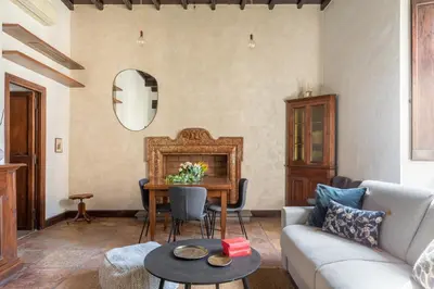 a living room with a couch and a table at iFlat Lovely flat in Navona in Rome