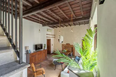 a living room with a couch and a tv at iFlat Lovely flat in Navona in Rome