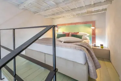 a bedroom with a bed in a room at Design apt near Spanish Step in Rome
