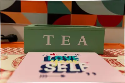 a cake with the words love sell on top of a table at MyWay Colosseo Apartment in Rome