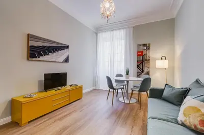 a living room with a couch and a table at Flaminio Lovely House in Rome