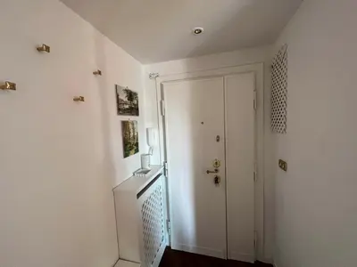a hallway with a white door and a counter at BUBUS Terrace in Rome