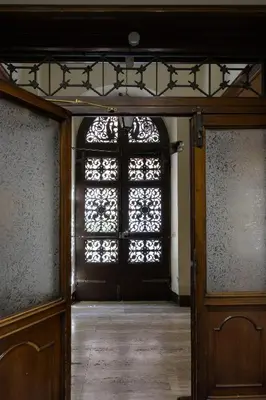 an entrance to a room with a door with a window at Casa Violante Luxury Apartment in Rome