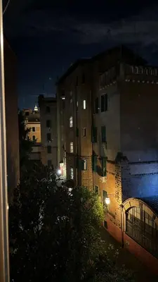 a view of a building at night with lights at My Sweet R-home in Vatican in Rome