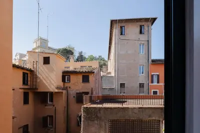 a view of a city from a window at Quiet apartment in the heart of Trastevere in Rome