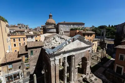 an aerial view of the ruins of a building at Portico d'Ottavia LUX in Rome