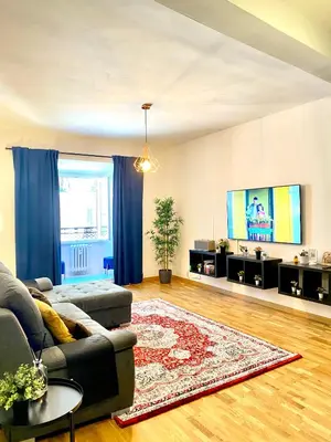 a living room with a couch and a tv at Dimora Centro Storico Roma in Rome