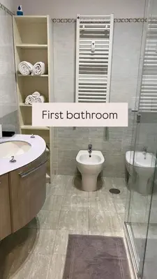 a bathroom with a toilet and a bidet and a sink at Dimora Centro Storico Roma in Rome