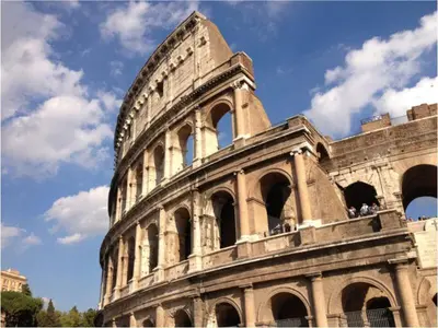 a building with people standing on top of it at Dimora Centro Storico Roma in Rome