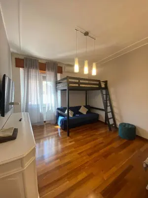 a bedroom with a bunk bed in a room at Appio11 Apartment in Rome
