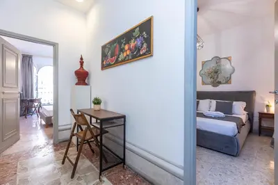 a living room with a couch and a table at Angelico By Rental in Rome in Rome