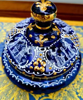 a blue and gold vase sitting on a table at PORTA MAGGIORE 9 ROMA Locazione Turistica in Rome