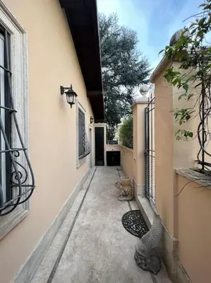 an empty hallway of a building with a door and a hallway at Residenza Morlupo (Fleming) in Rome