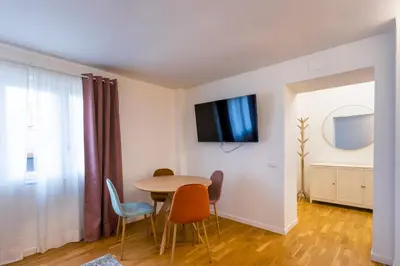 a dining room with a table and chairs at Vatican Vita Apartment in Rome