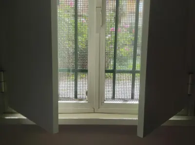 an open window in a room with a window sill at TIBERIVS Home in Rome