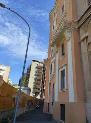 a street light in front of a building at TIBERIVS Home in Rome