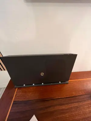 a black box sitting on top of a wooden floor at Loft Villa Blanc in Rome