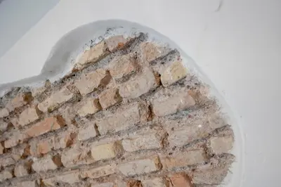 a brick wall with a snow dome on top at Home d'Elite Trevi Fountain in Rome
